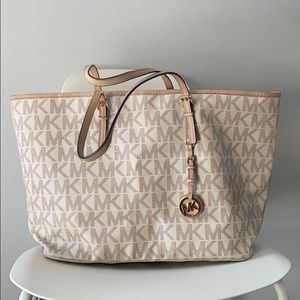 White monogram MK tote. Gently used